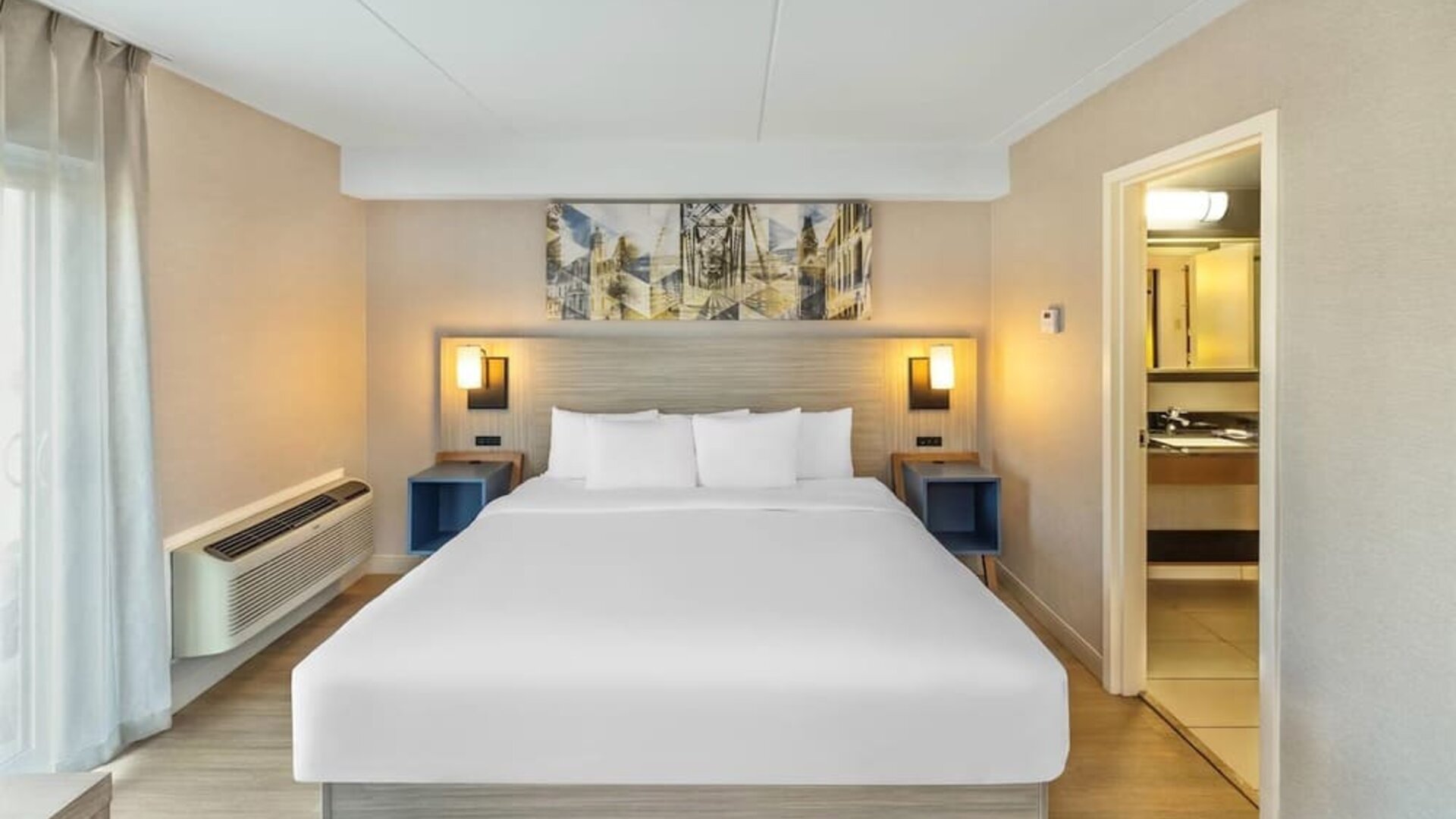 Guest room with a king bed at Comfort Inn Saskatoon.