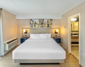 Guest room with a king bed at Comfort Inn Saskatoon.