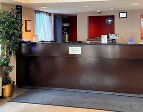Hotel reception desk at Comfort Inn Saskatoon.