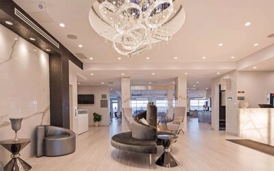 Hotel lobby with lounge area at Executive Residency By Best Western.