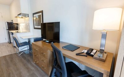 Day use guest room with work desk and in-door kitchen at Executive Residency By Best Western.