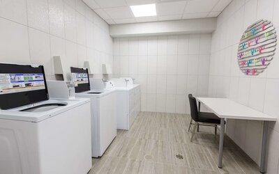 Laundry facility at Executive Residency By Best Western.