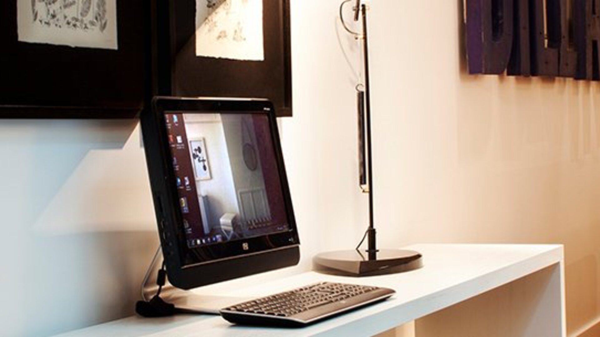 Business center at Hotel Pulitzer Buenos Aires featuring a desktop computer and dedicated workstation.