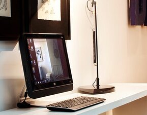 Business center at Hotel Pulitzer Buenos Aires featuring a desktop computer and dedicated workstation.