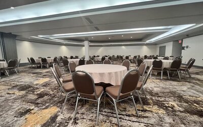 Flexible meeting facility featuring banquet-style seating and a spacious layout suitable for conferences, events and social gatherings at Holiday Inn Toronto Airport East.