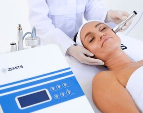Facial treatment at SKYLARANNA Resort & Spa, featuring a professional skincare treatment using specialised spa equipment.