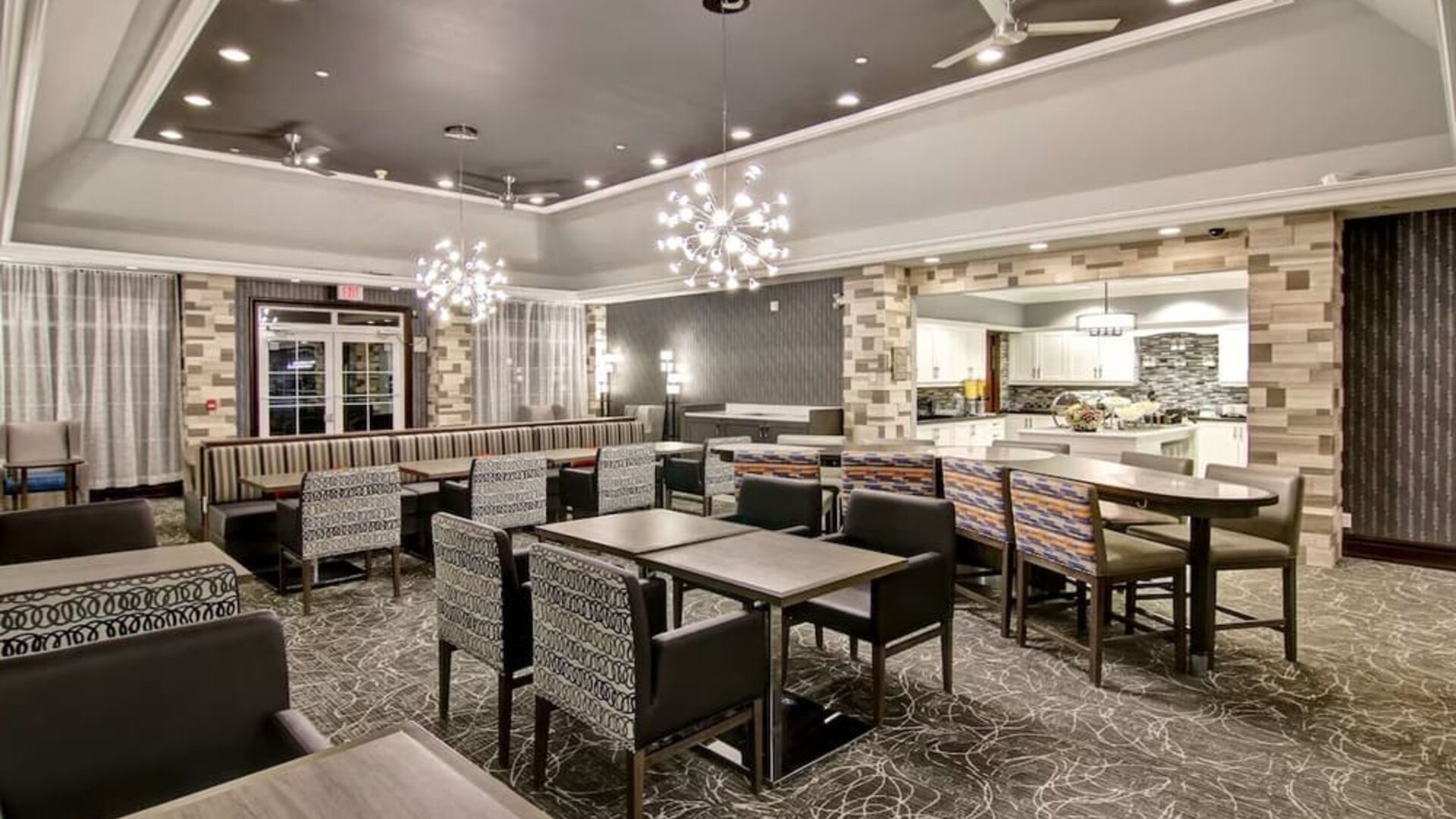 Dining area perfect for co-working at Homewood Suites By Hilton Burlington.