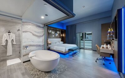 Spacious day use room with tub, work desk and balcony at Shade Hotel Manhattan Beach.