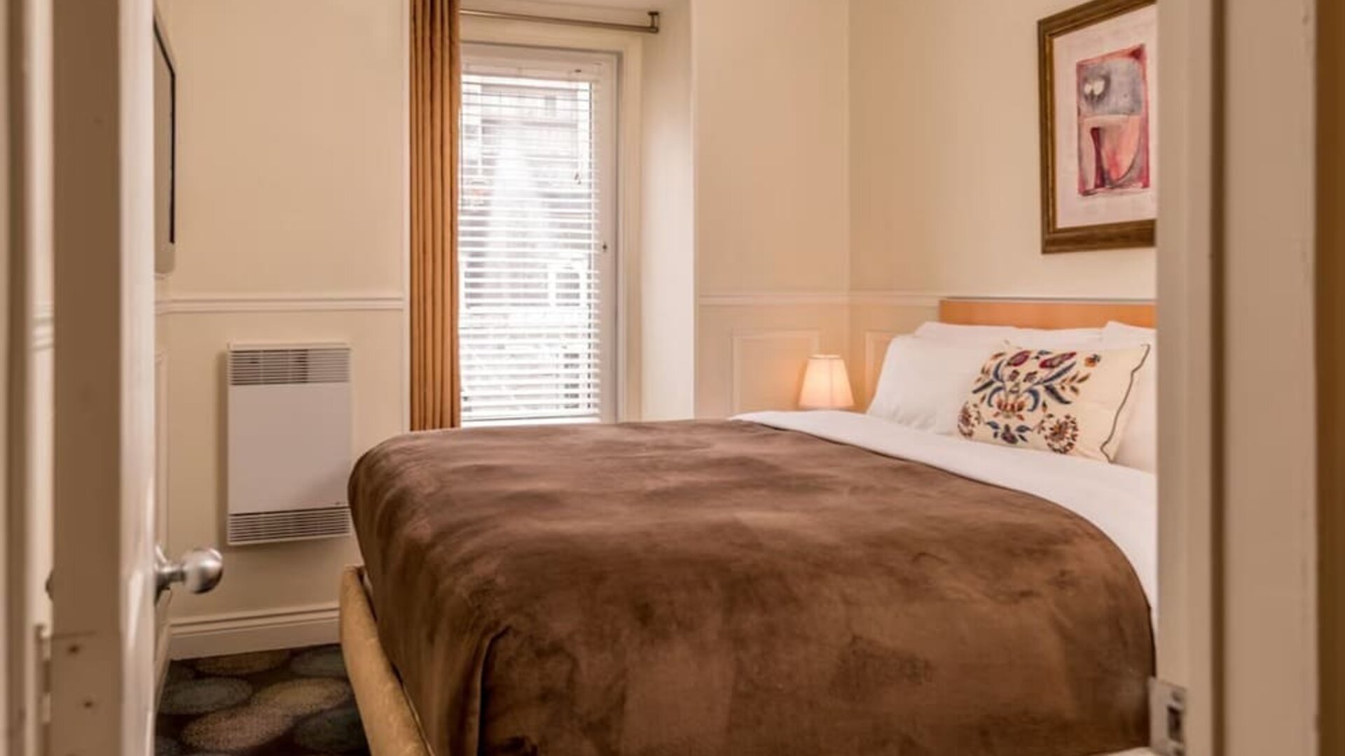 King bed day use room at Parc Suites Hotel.