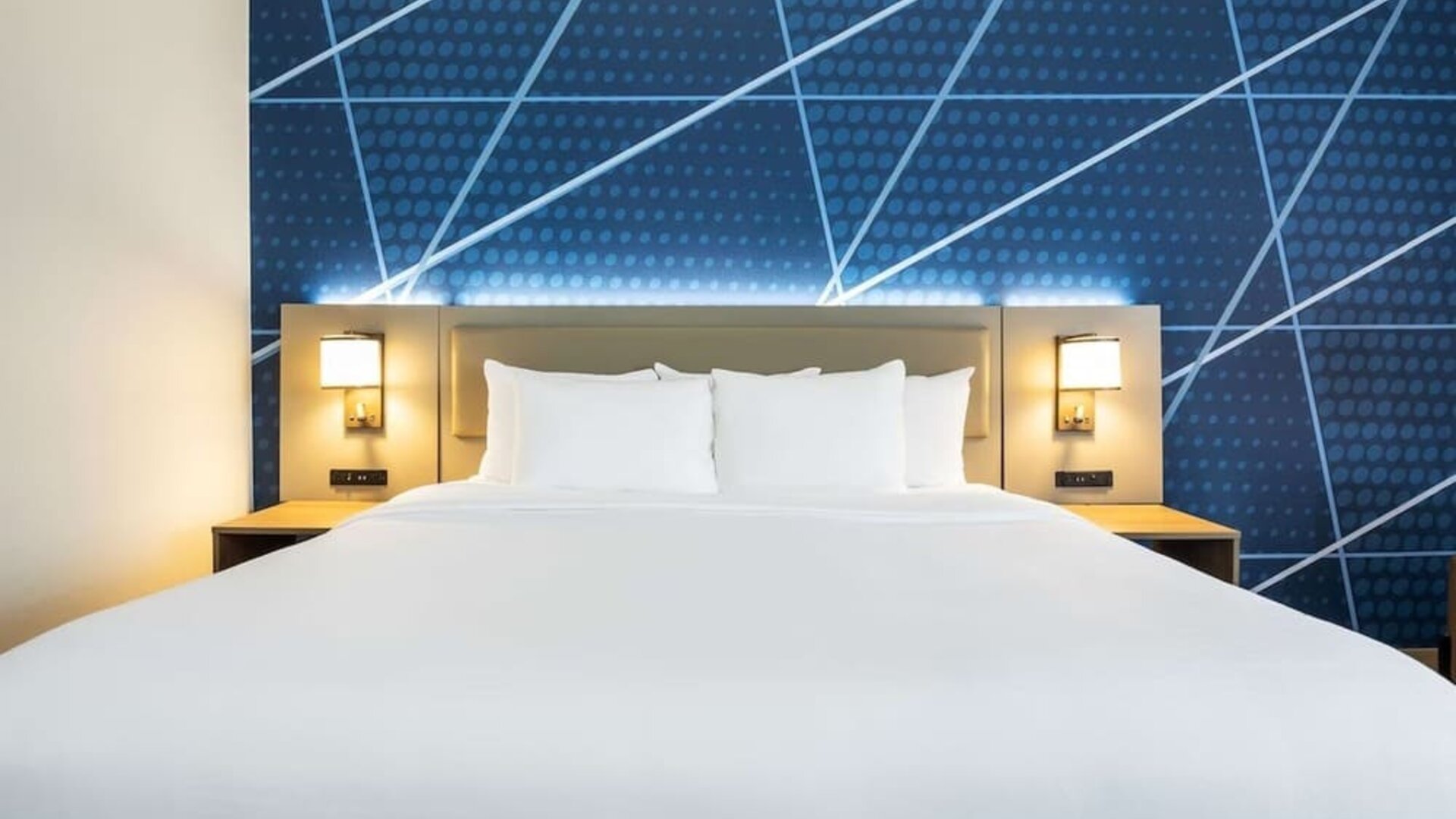 Comfortable king bed at Comfort Inn & Suites Barrie.