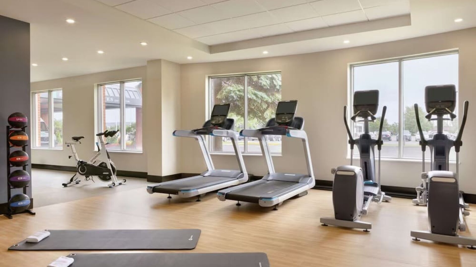 Fully equipped fitness center at the Embassy Suites by Hilton Montreal Airport.
