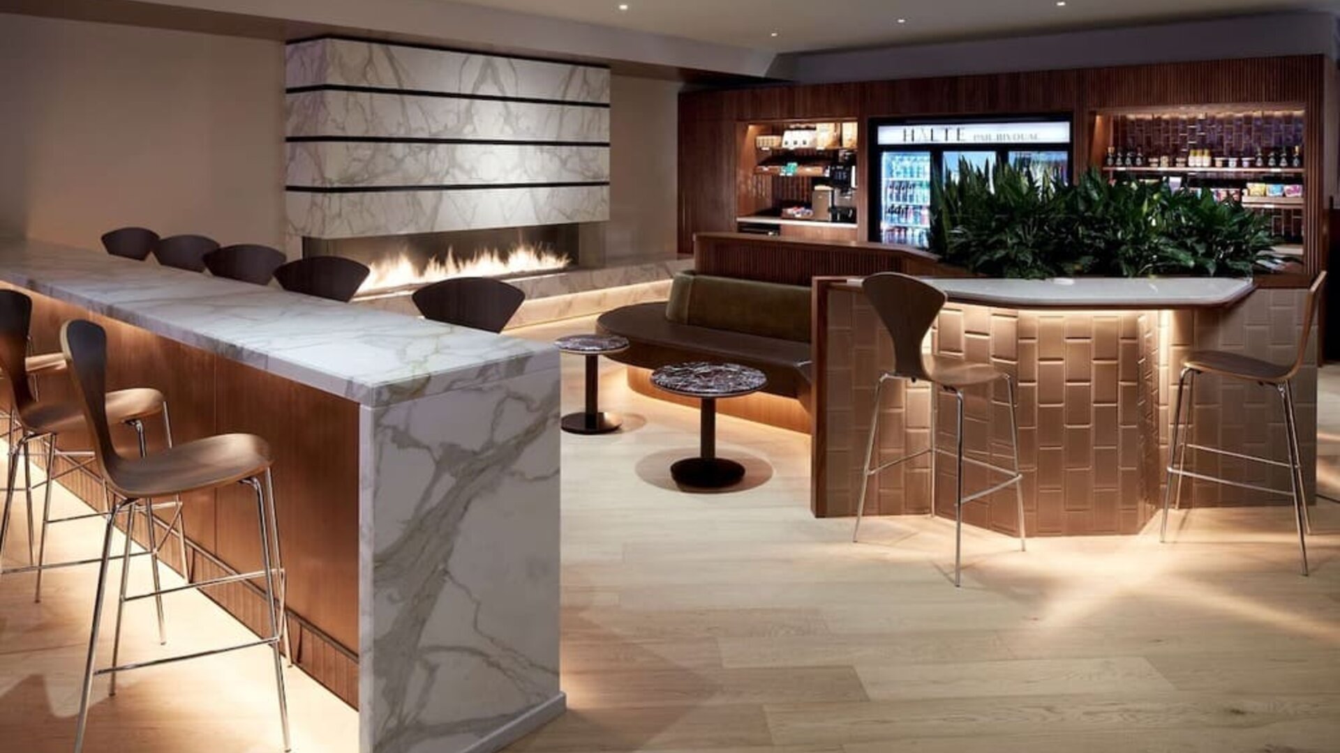 Hotel lounge with fireplace at DoubleTree By Hilton Montreal.