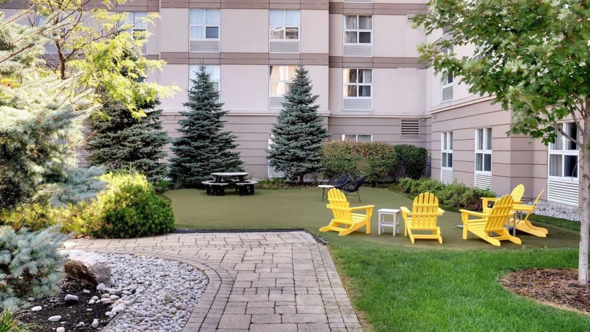 Hotel exterior patio at Homewood Suites By Hilton Toronto-Markham.