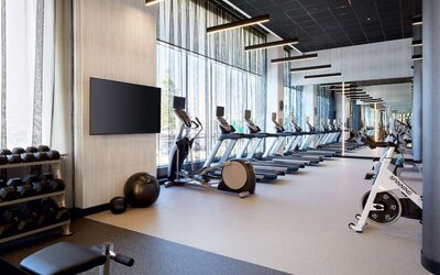 Fully equipped fitness center at Hilton Garden Inn Montreal Midtown.