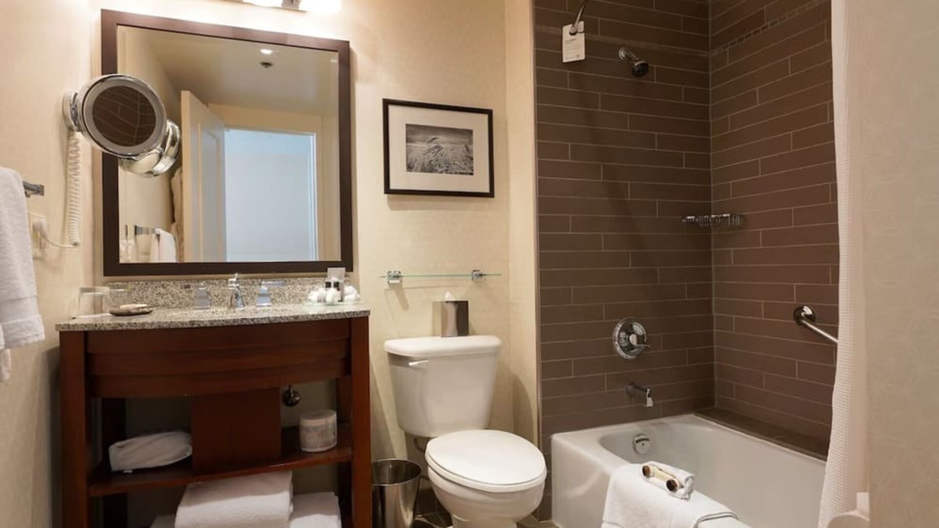 Guest bathroom with shower and tub at Fairmont Winnipeg.