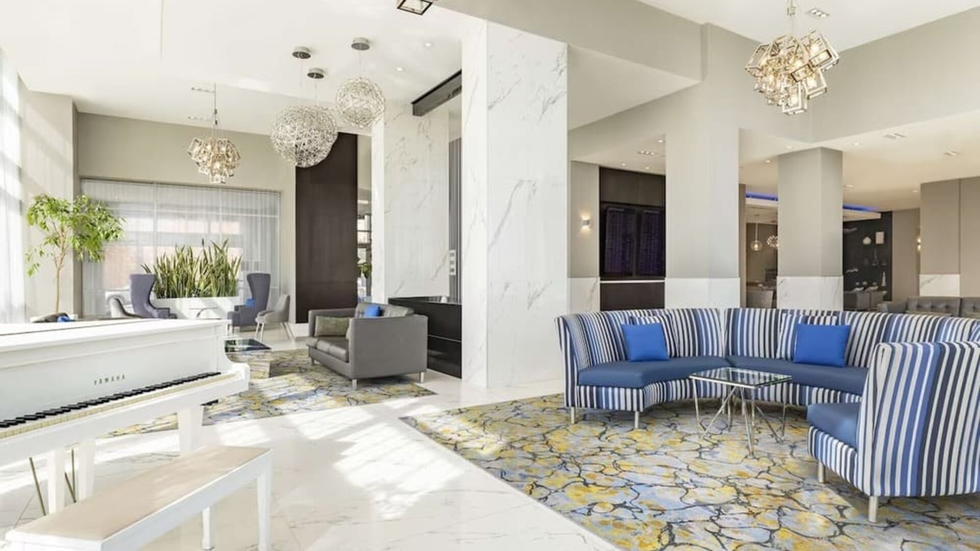 Hotel lobby with lounge area perfect for co-working at the Embassy Suites By Hilton Toronto Airport.