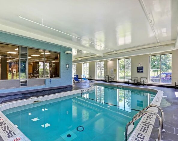Relaxing indoor pool at the Four Points By Sheraton St Catharines Niagara Suites.