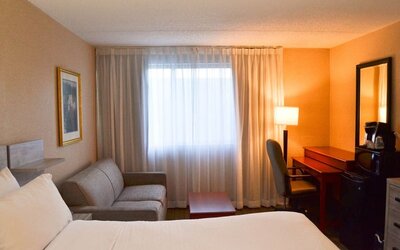 Day use room with sofa, work desk, mini bar and private bathroom at Amenida Residences.