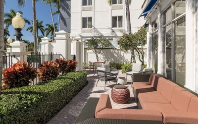 Outdoor seats available at Hilton Garden Inn Boca Raton.