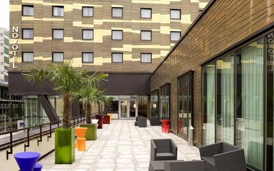 Spacious balcony with seats at Novotel London Paddington.
