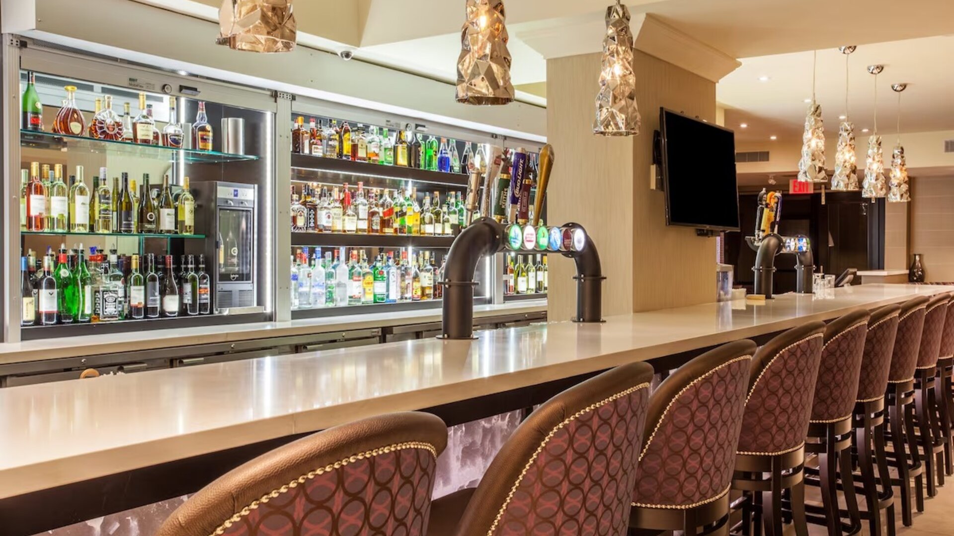 Hotel bar with lounge area at Holiday Inn Toronto International Airport.