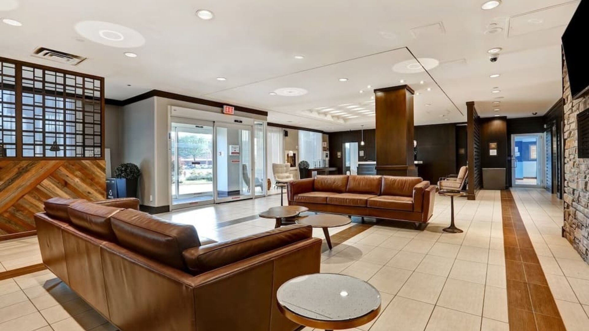 Hotel lobby with lounge seating at Four Points By Sheraton Toronto Mississauga.