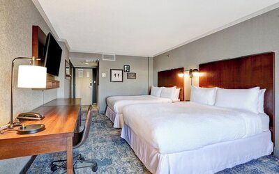 Day use twin room with TV, work desk and private bathroom at Four Points By Sheraton Toronto Mississauga.