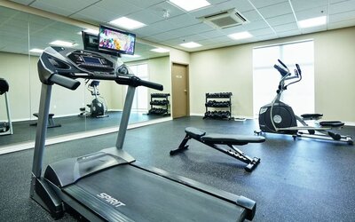 Fitness center at Quality Inn & Suites Kingston.