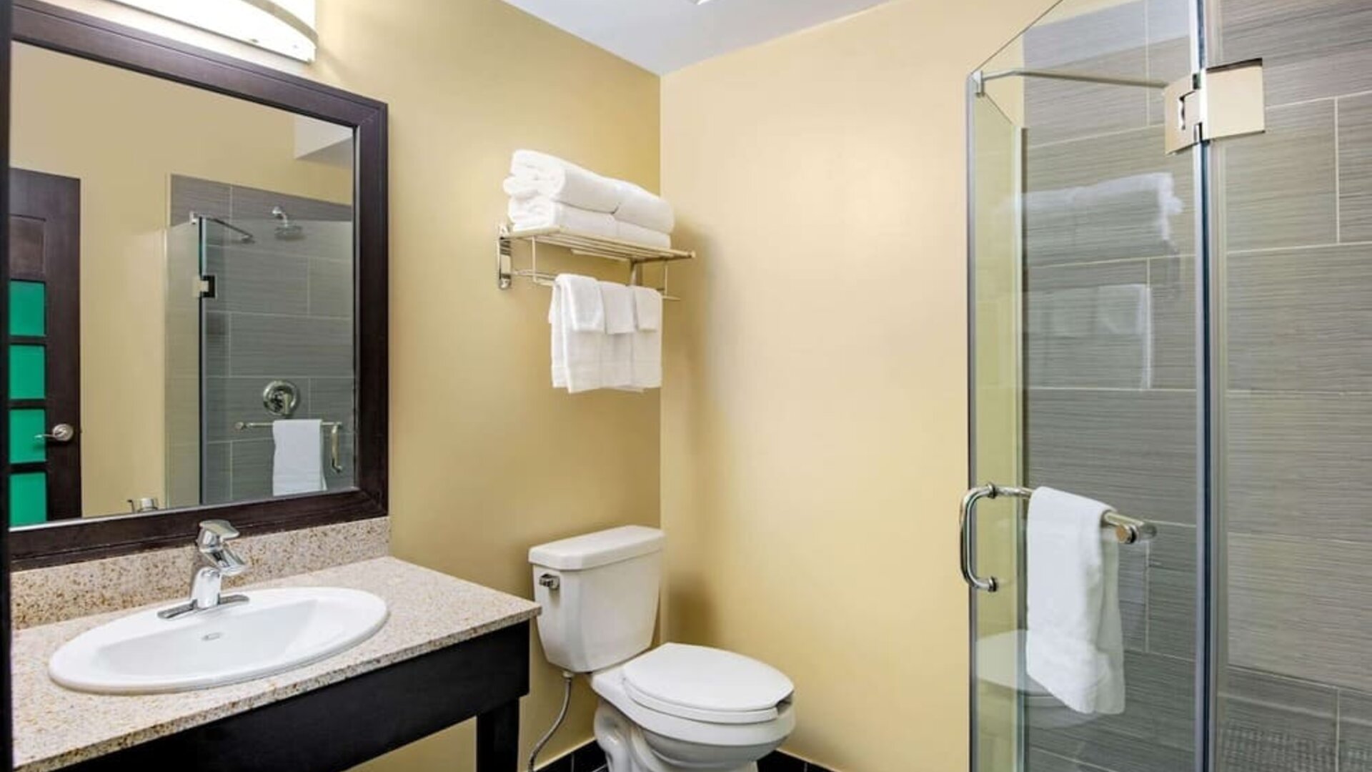 Private guest bathroom at La Quinta Inn & Suites By Wyndham Oshawa.