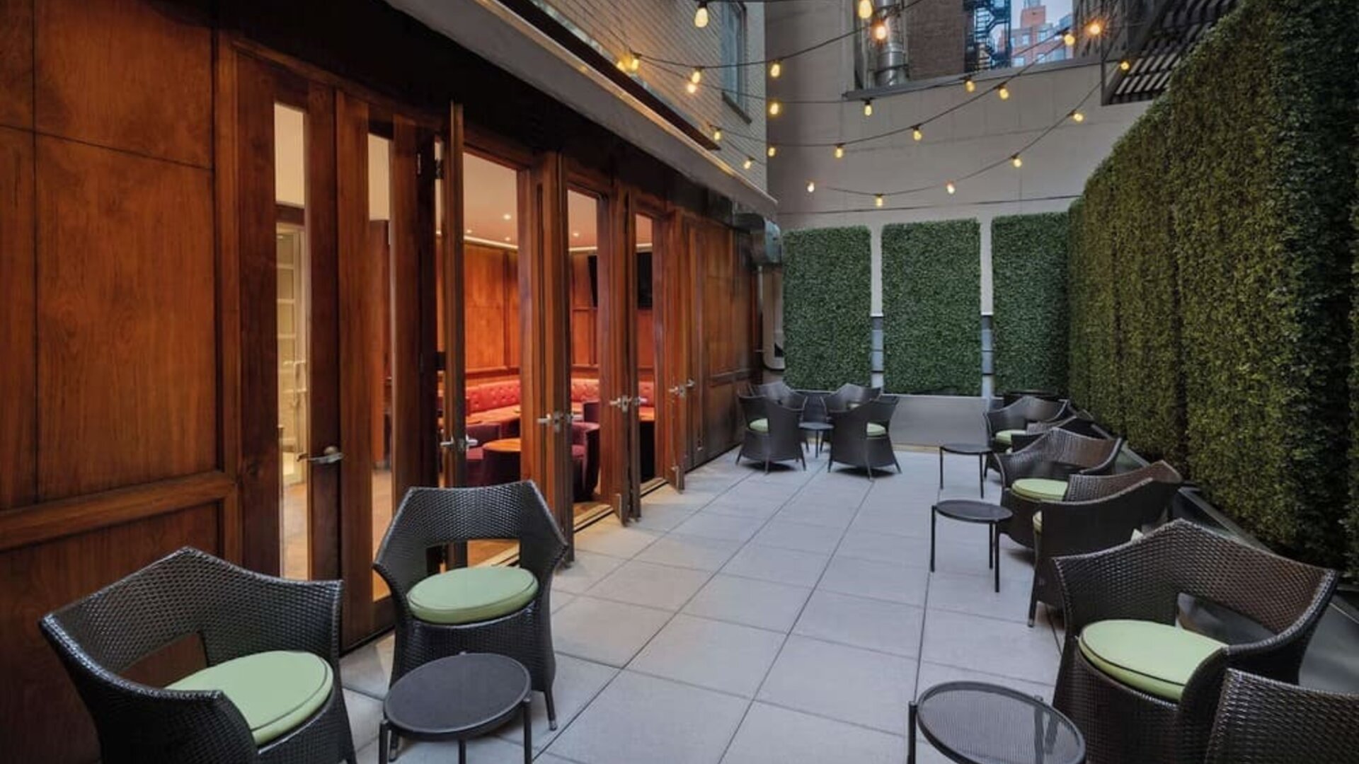 Veranda with ample seats perfect for coworking at Best Western Premier Herald Square.