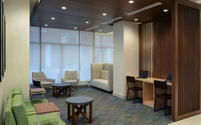 Lobby lounge with workspace at Holiday Inn Express Toronto Downtown.