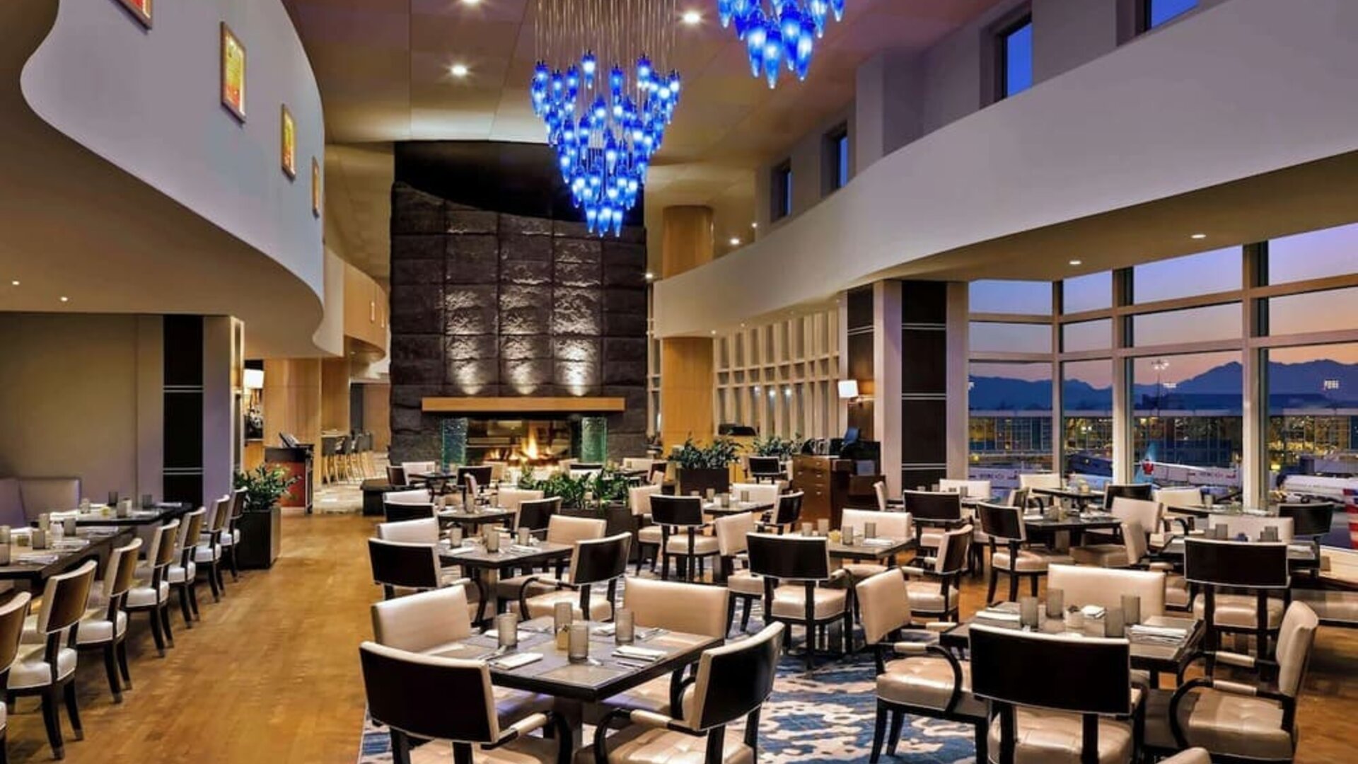 Hotel restaurant with comfortable sitting at Fairmont Vancouver Airport - YVR Terminal Hotel.