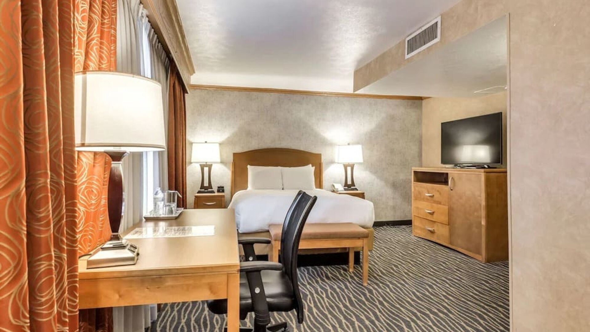 Day use room with work desk at Radisson Hotel Salt Lake City Airport.