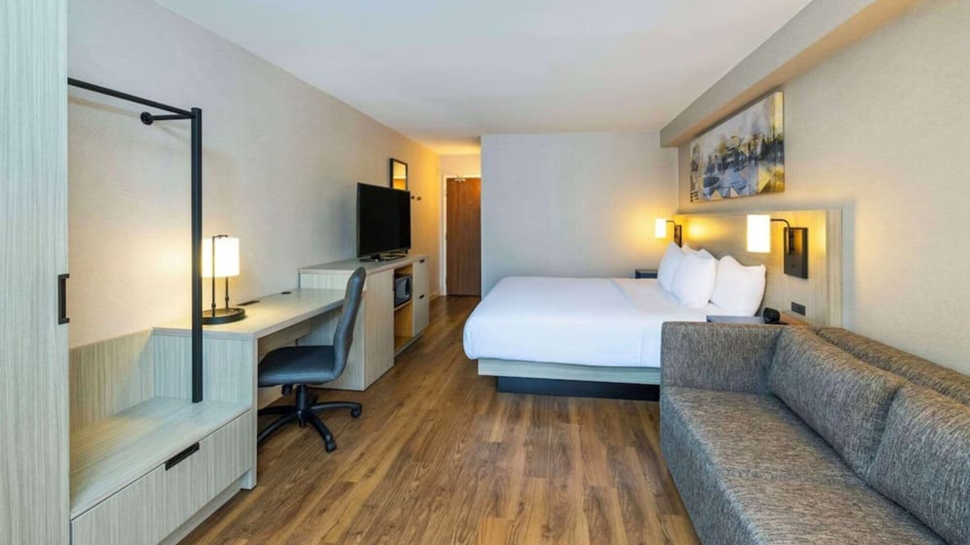 Day use room with TV, sofa, work desk and private bathroom at Comfort Inn Corner Brook.