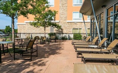Outdoor furniture available at Cambria Suites Denver Airport.