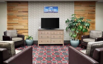 Lobby and coworking lounge at Wyndham Garden Pittsburgh Airport.