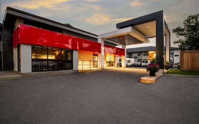 Hotel entrance and parking area at Comfort Inn Ottawa West.