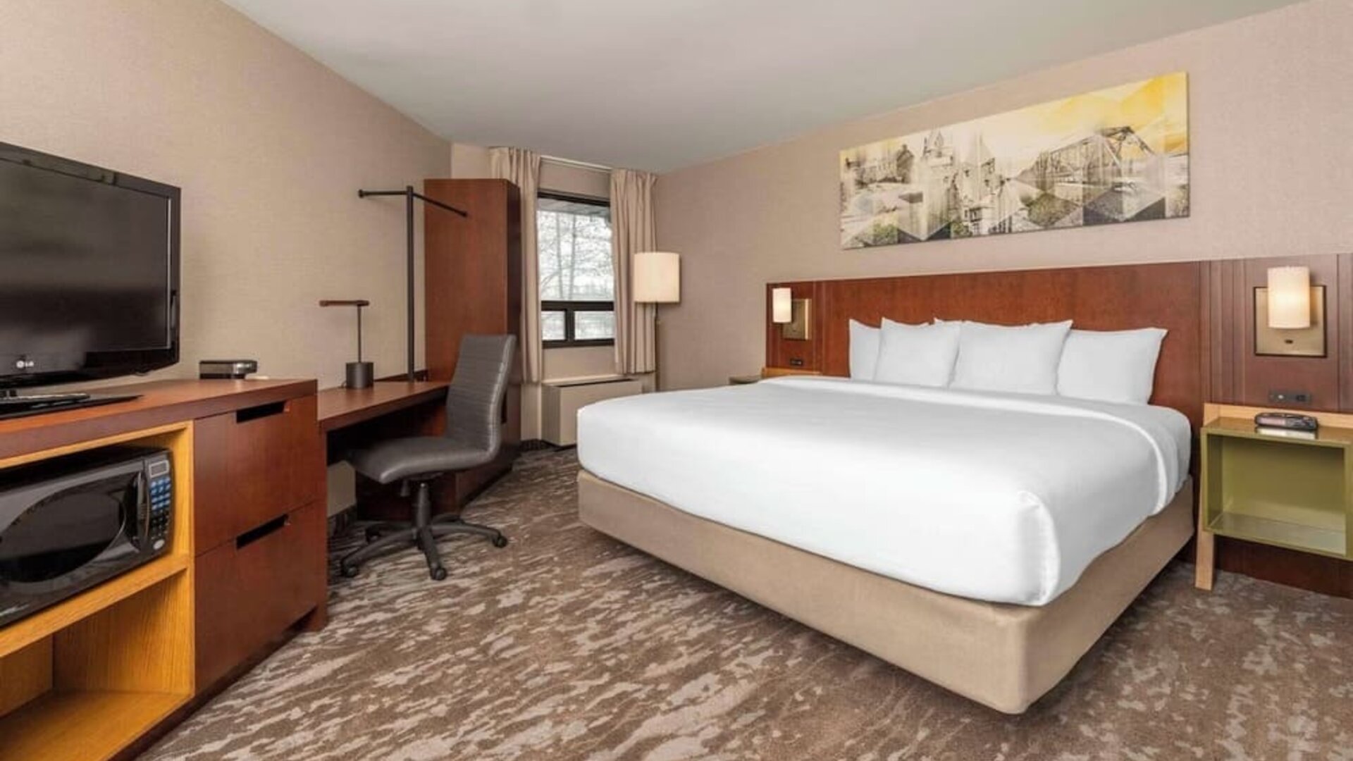 Bright and spacious day use room with work desk at Comfort Inn Hamilton.