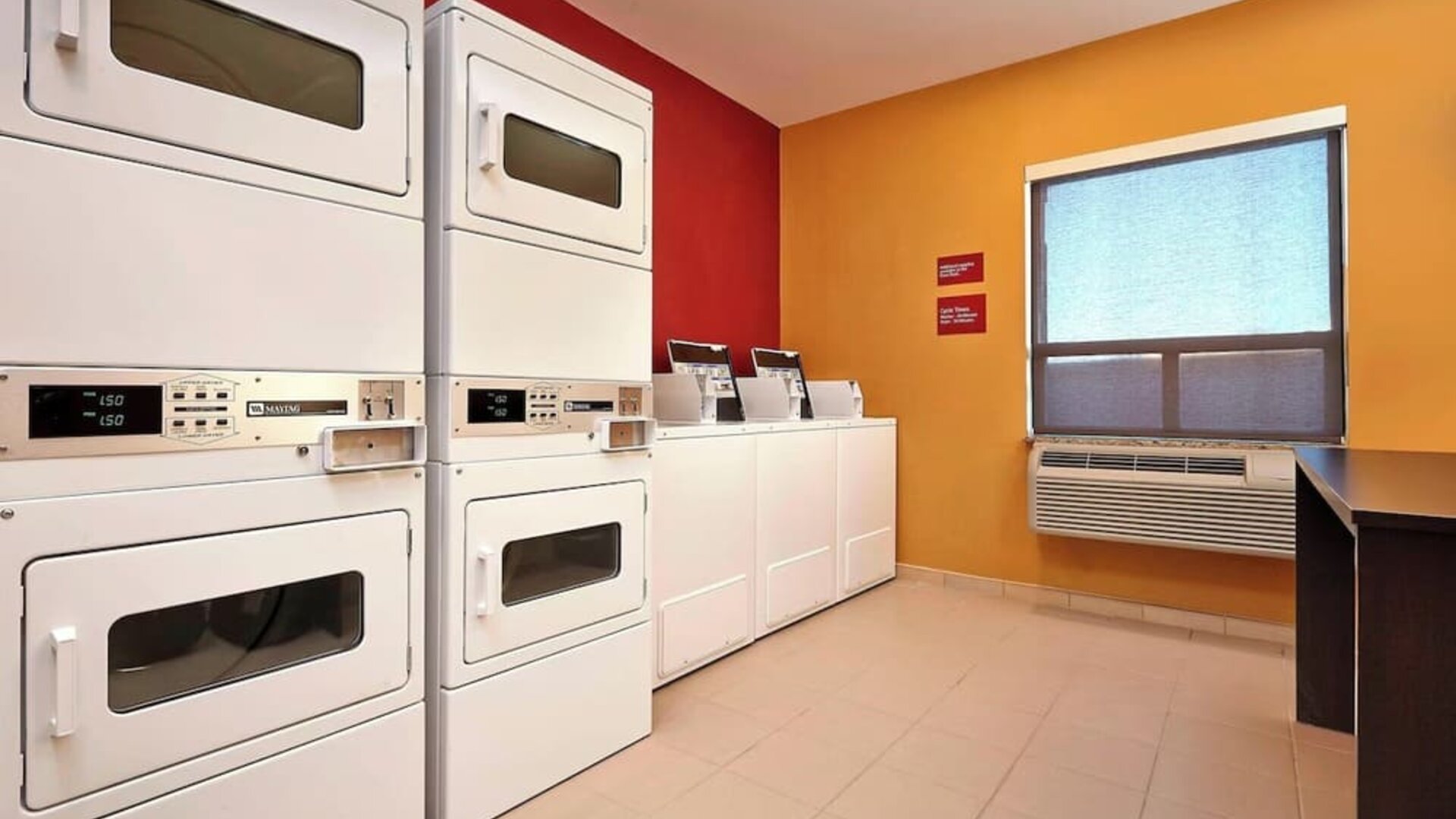 Laundry room at TownePlace Suites By Marriott London.