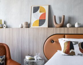 Cozy king room at Pullman Lyon.