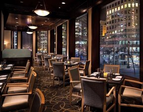 Dining area with comfortable seating, perfect for co-working at Hyatt Regency Vancouver.
