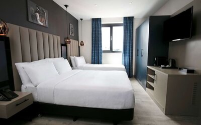 Day use room with TV at Spark By Hilton Luton.