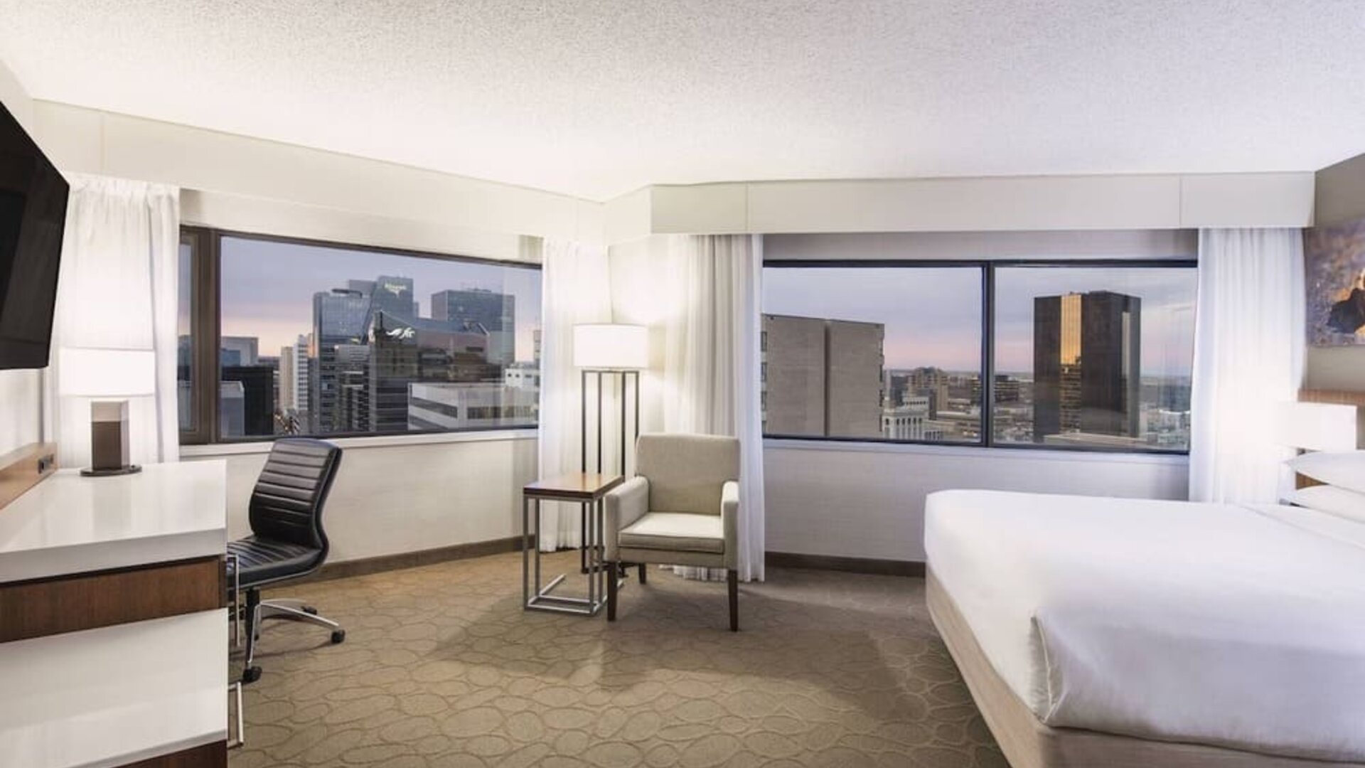 Day use room with TV, work desk and private bathroom at Delta Hotel By Marriott Regina.