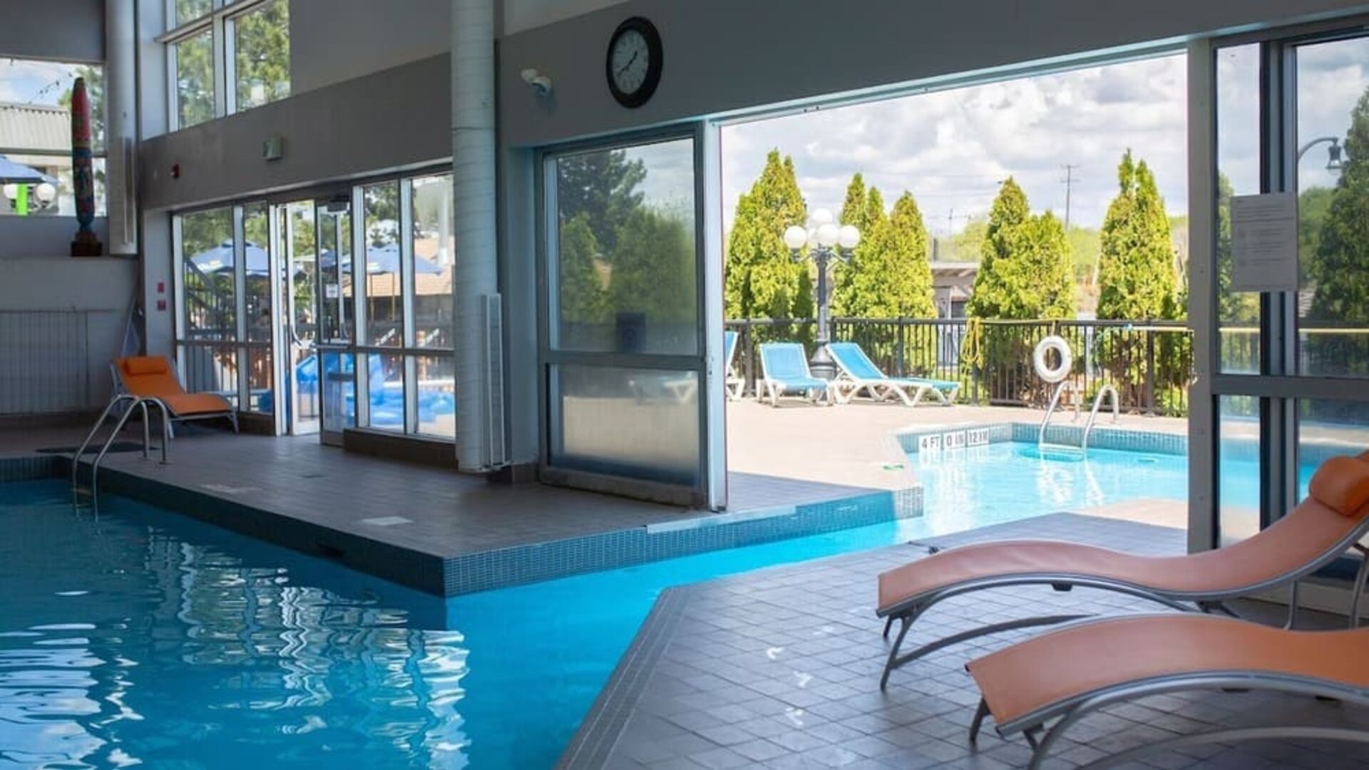 Combined indoor and outdoor pool at Holiday Inn Peterborough-Waterfront.