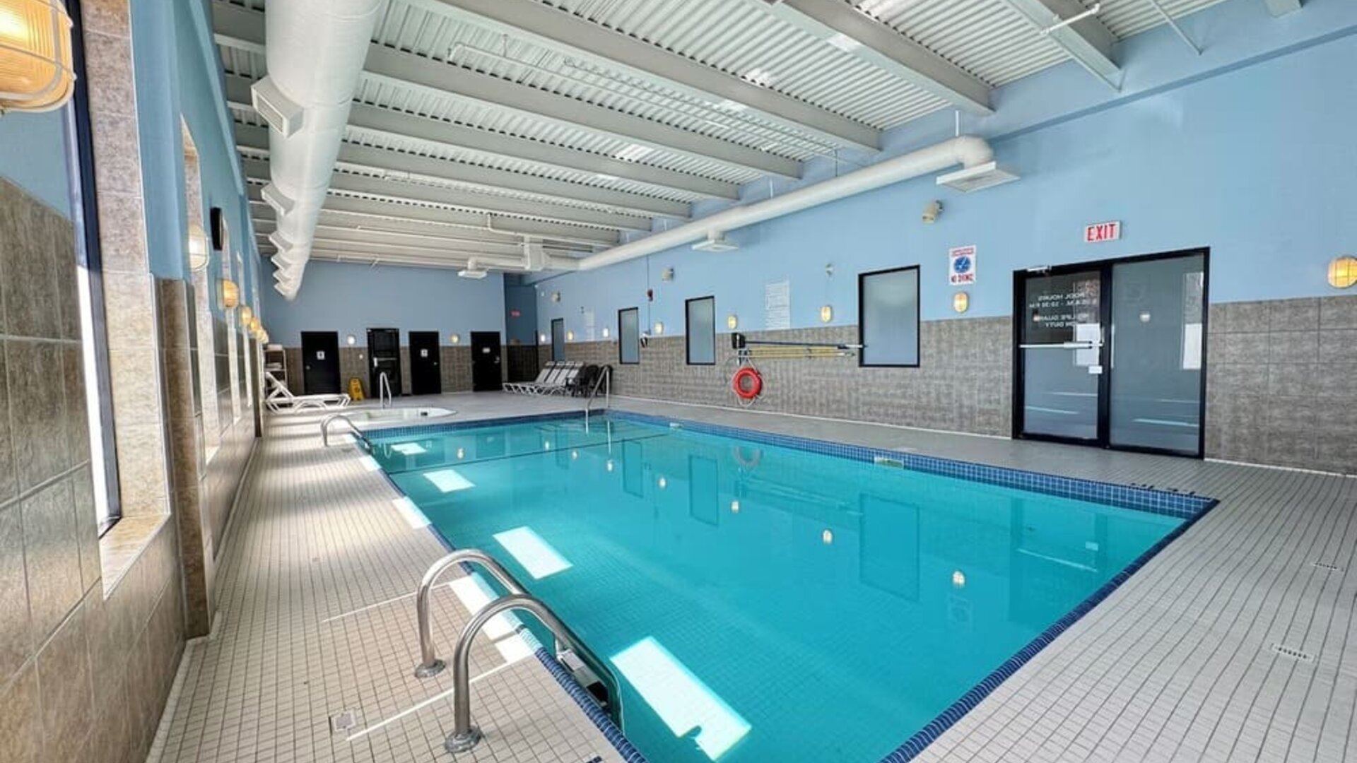 Relaxing indoor pool at Divya Sutra Plaza & Conference Centre.