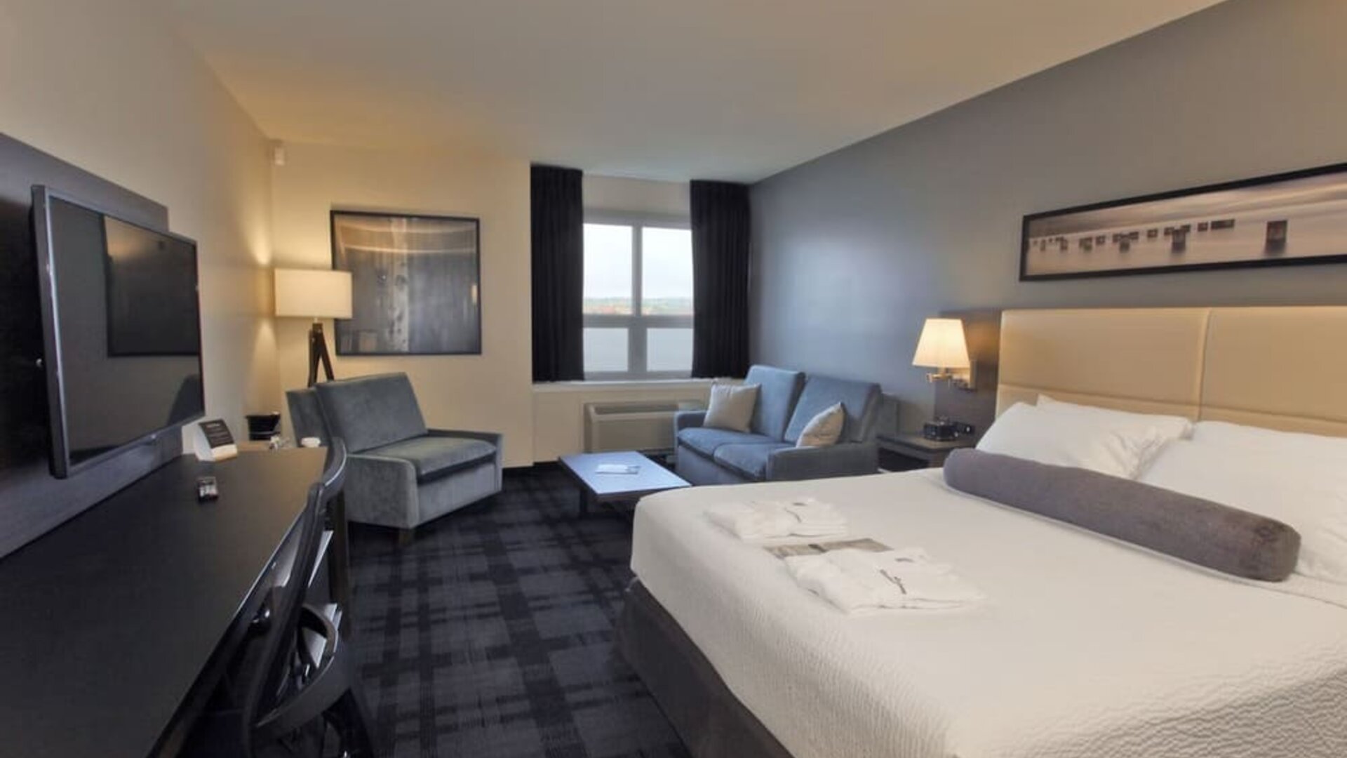 Day use room with living area and workspace at Rodd Miramichi River.