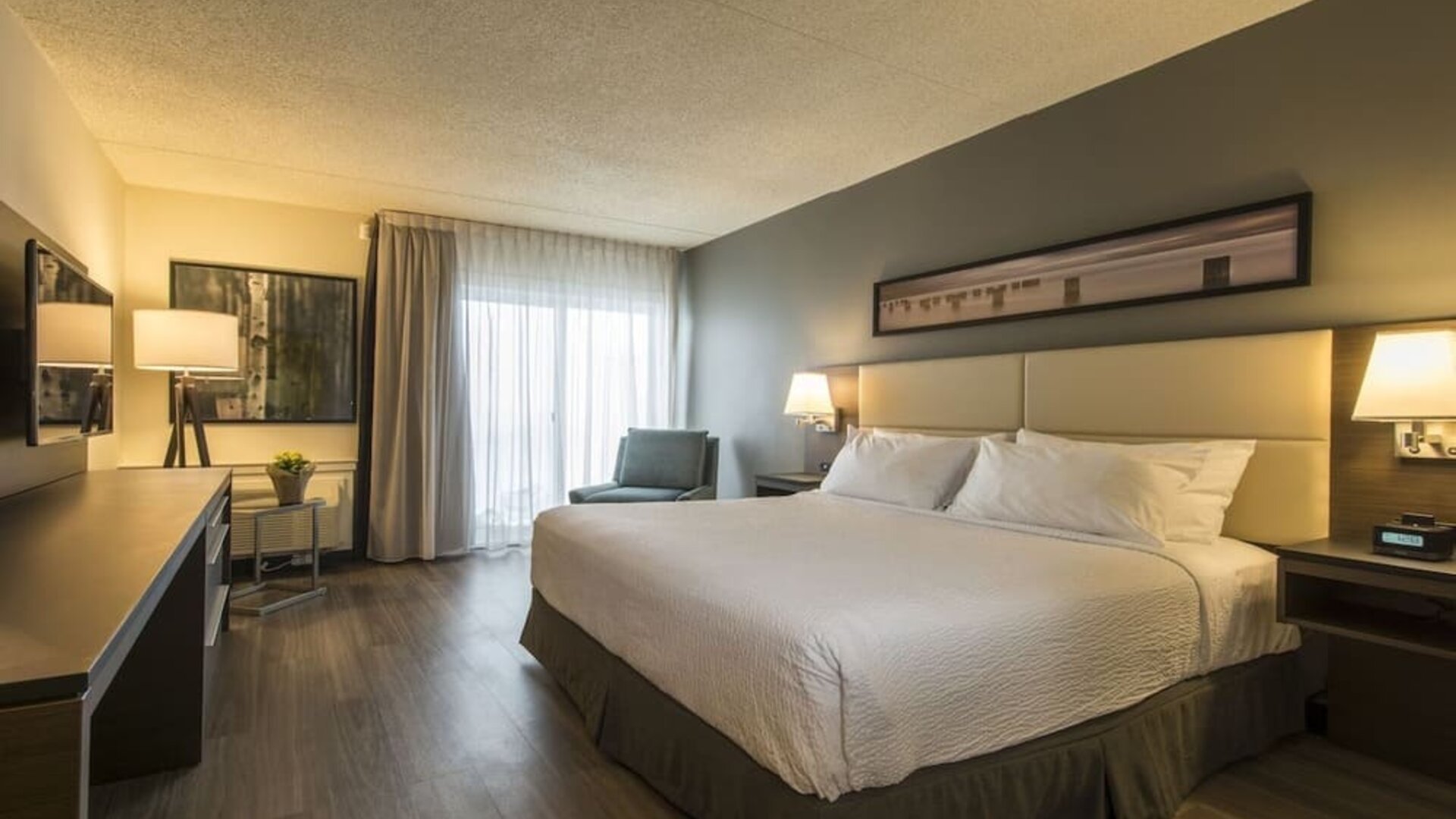 Bright and spacious day use room with work desk at Rodd Miramichi River.