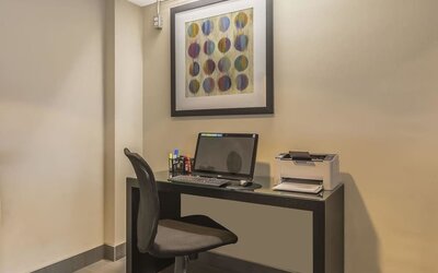 Business center with computer, printer and ergonomic chair at Comfort Inn Belleville.