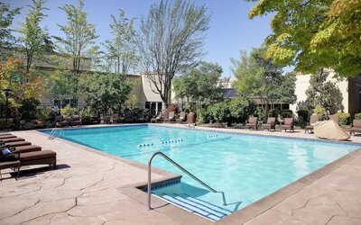 Refreshing outdoor pool at Hilton Seattle Airport & Conference Center.
