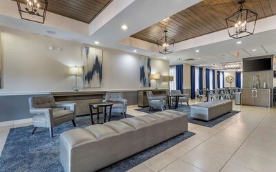 Lobby and coworking lounge at Best Western Sugar Land Inn.